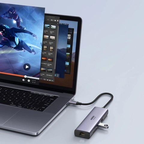 HUB 7w1 Ugreen CM512 USB-C / 2x USB-A 3.2 / HDMI 4K / czytnik SD TF / USB-C PD 100W / RJ45 - szary HUB 7w1 Ugreen CM512 USB-C / 2x USB-A 3.2 / HDMI 4K / czytnik SD TF / USB-C PD 100W / RJ45 - szary