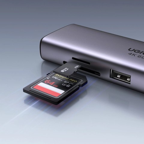 HUB 7w1 Ugreen CM512 USB-C / 2x USB-A 3.2 / HDMI 4K / czytnik SD TF / USB-C PD 100W / RJ45 - szary HUB 7w1 Ugreen CM512 USB-C / 2x USB-A 3.2 / HDMI 4K / czytnik SD TF / USB-C PD 100W / RJ45 - szary