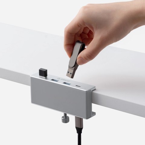 Hub Orico MH4PC montowany na zacisk USB-C / 3x USB-A 3.0 + 1x USB-C 3.0 - srebrny Hub Orico MH4PC montowany na zacisk USB-C / 3x USB-A 3.0 + 1x USB-C 3.0 - srebrny