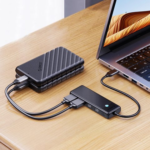 Hub USB-C Orico PAPW2AC-C3 stacja dokująca 2x USB-A 3.0 + 2x USB-C 3.0 - czarny Hub USB-C Orico PAPW2AC-C3 stacja dokująca 2x USB-A 3.0 + 2x USB-C 3.0 - czarny