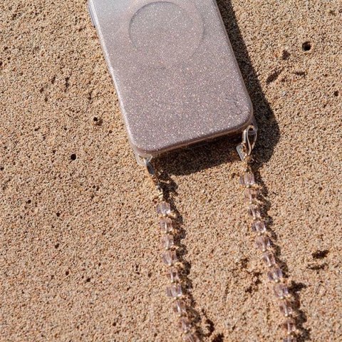 Zawieszka UNIQ Coehl Candy Gem Handstrap uniwersalny sznurek do telefonu na rękę - różowa Zawieszka UNIQ Coehl Candy Gem Handstrap uniwersalny sznurek do telefonu na rękę - różowa