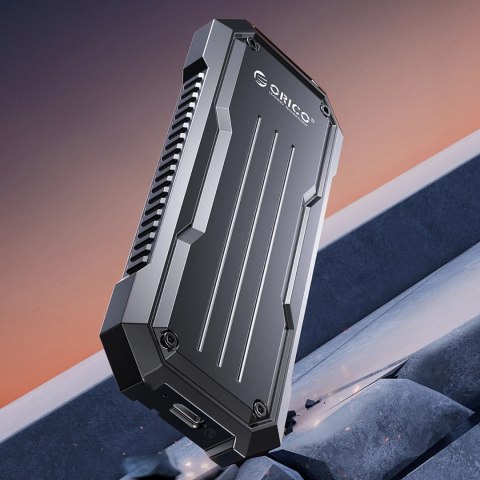 Wzmocniona kieszeń dyskowa Orico OXS2C3-G2 M.2 NVMe/SATA SSD USB-C 3.2 taktyczna - szara Wzmocniona kieszeń dyskowa Orico OXS2C3-G2 M.2 NVMe/SATA SSD USB-C 3.2 taktyczna - szara